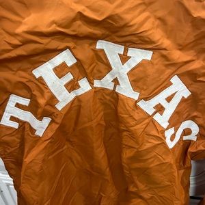 Burnt orange vintage Texas Russell Athletics snap jacket size small. Very nice!